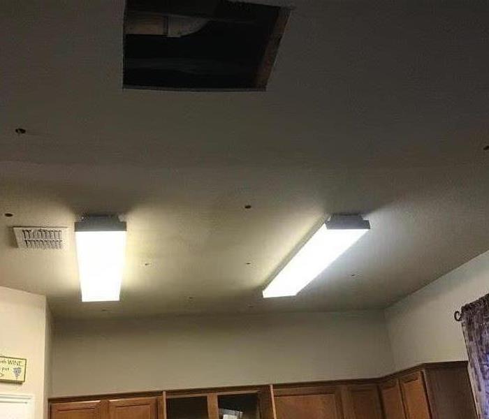 Dry kitchen ceiling with some drywall removed