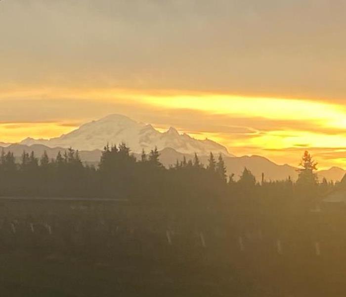 Sun rising over mountains